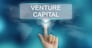 hand pushing on venture capital balloon text button