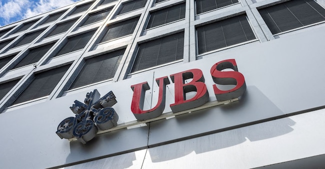 FILE PHOTO: A UBS logo is pictured on the branch of the Swiss bank in Lucerne, Switzerland, June 14, 2024.  REUTERS/Denis Balibouse/File Photo