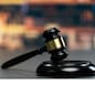 Black wooden gavel hammer on law firm or lawyer office background as justice and the legal system for lawyer and judge, Symbolize authority and fairness in trials and auctions. Equilibrium