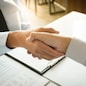 business negotiation in meeting hands shaking successful agreement