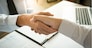 business negotiation in meeting hands shaking successful agreement