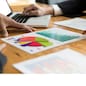 businessman meeting, analyzing and discussing with computer and paperwork document