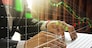 Double exposure of businessman using the laptop with stock market or financial graph for financial investment concept, Business investment and trading concept.