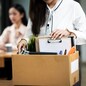 Resign From Job Or Fired Employee Moving Out Of Office, Frustrated Fired Asian Employee Woman Packing Belongings In Cardboard Box