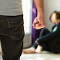 Man beating up his wife illustrating domestic violence