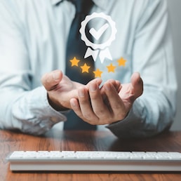 Hand shows the sign service Quality assurance 5 star, Guarantee, Standards, ISO certification and standardization concept.