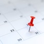 Red push pin on calendar 31st day of the month, new year eve