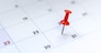 Red push pin on calendar 31st day of the month, new year eve