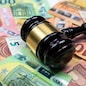 rule of law and auctions with judge's gavel and euro banknotes. Crime concept