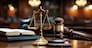 Close-up shot of the gavel on the judge's desk symbolizing court trials, justice, and legal decisions in the courtroom. The gavel and scales of justice representing law and justice concepts