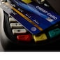 Credit cards placed on credit card swipes
