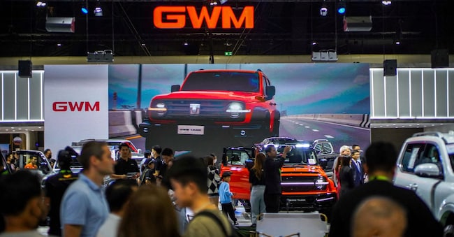 FILE PHOTO: People visit the Great Wall Motor booth at the 41st Thailand International Motor Expo, in Bangkok, Thailand, November 29, 2024. REUTERS/Athit Perawongmetha/File Photo