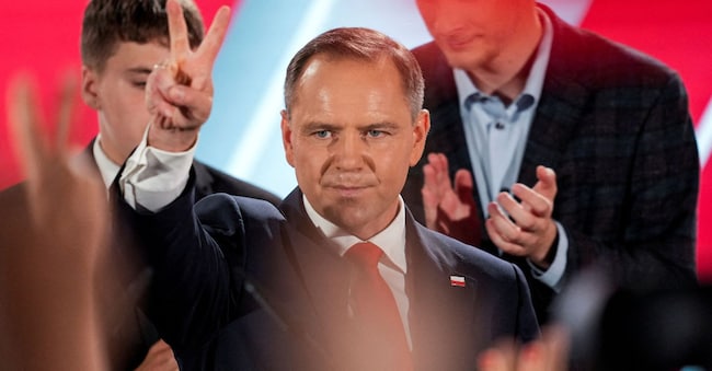 Polish presidential candidate Karol Nawrocki, backed by the main opposition Law and Justice (PiS) party, reacts to the exit polls of the second round of the presidential election, in Warsaw, Poland, June 1, 2025. REUTERS/Aleksandra Szmigiel     TPX IMAGES OF THE DAY