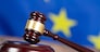 Judge hammer with European flag background