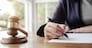 business woman or lawyer working with legislation documents.