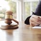 business woman or lawyer working with legislation documents.