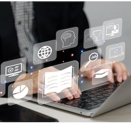 Businessman using laptop computer icon virtual screen education online and e learning on desk.