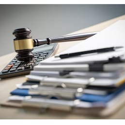 Judge hammer and business report papers, important documents