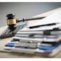 Judge hammer and business report papers, important documents