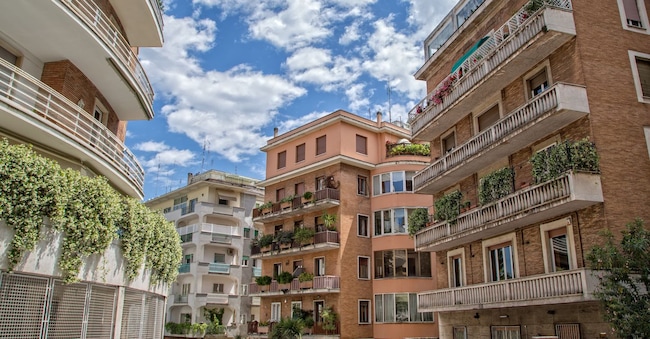 House building exterior facade with windows and balconies in Parioli district, Rome, Italy