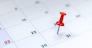 Red push pin on calendar 31st day of the month, new year eve