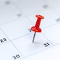 Red push pin on calendar 31st day of the month, new year eve