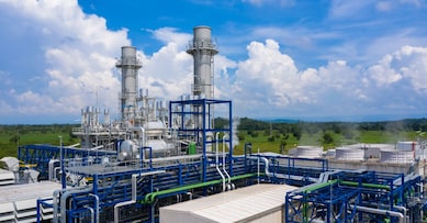 Power plant with blue sky.