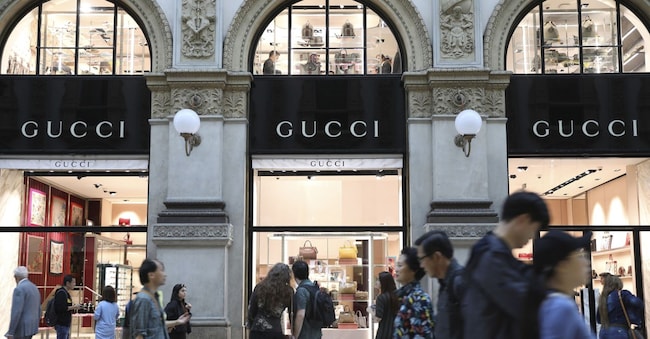 Pedestrians pass a Gucci store in the Galleria Vittorio Emanuele shopping mall in Milan, Italy, on Tuesday, October 1st, 2019. Photographer: Alessia Pierdomenico/Bloomberg