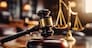 Close-up of gavel on judge desk, symbolizing court trial, justice and legal decisions in courtroom