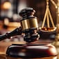 Close-up of gavel on judge desk, symbolizing court trial, justice and legal decisions in courtroom