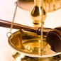 Wooden justice gavel and block with brass
