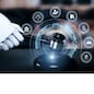 AI related law concept shown by robot hand using lawyer working tools in lawyers office with legal astute icons depicting artificial intelligence law and online technology of legal law regulations
