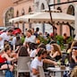 Ancona, Italy - June 8 2019: People enjoying summer day and food at outdoor restaurant and resting, Piazza del Plebiscito, Ancona, Italy