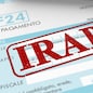 close up view of F24 form for italian taxes,the word irap and an electronic calculator (3d render)