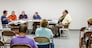 H84GTK Miami Beach Florida,condominium board meeting,Hispanic Latin Latino ethnic immigrant immigrants minority,adult adults man men male,members,residents,v