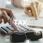 women using calculator calculated individual income tax for pay taxes annual.Financial research,government taxes and calculation tax return concept. Tax and Vat concept.