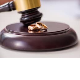 Judge gavel deciding on marriage divorce