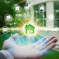 Hand holding with property investment Icons over the Network connection on property background, Property investment concept.