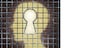 Creative freedom key with a human head light glowing on a brick wall through a prison cage opened with a keyhole shape as a business and mental health concept searching for innovative solutions to be set free for success.