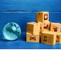 Planet Earth globe and cardboard boxes mass consumption products. Delivering goods around the world. International trade and transportation of goods. Shipping freight. Transnational business industry.