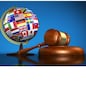 International law systems, justice, human rights and global business education concept with world flags on a school globe and a gavel on a desk on blue background.
