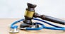 law gavel with sthetoscope, medical law concept