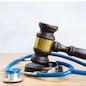 law gavel with sthetoscope, medical law concept
