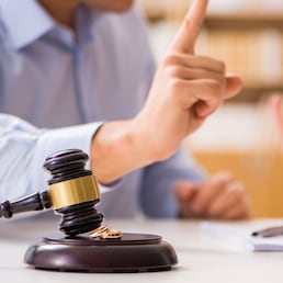 Judge gavel deciding on marriage divorce