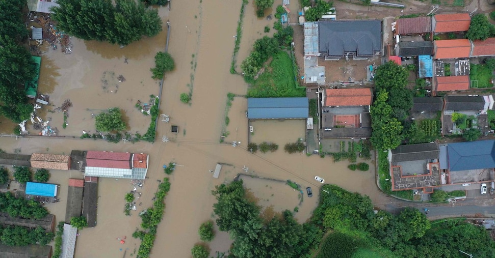 Forti piogge a Pechino, 30 morti e 80mila sfollati Forti piogge a Pechino, 30 morti e 80mila sfollati