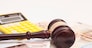 Judge gavel, euro banknotes and calculator