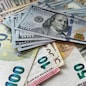 Detailed macro shot of dollar and euro bills. Currency comparison, global finance, forex market and economic background. Close-up footage of US dollar and Euro banknotes. Financial concept showing international currency, exchange rates, money circulation, and global economy. High quality FullHD footage
