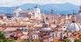 Aerial panoramic view of Rome, Italy. Beautiful Rome skyline in summer. Scenic panorama of Roma city from above. Scenery of historical area of Rome in sunlight. Horizontal banner with Rome for web.