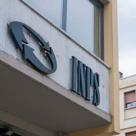 Carrara, Italy - May 24, 2020 - The INPS sign, the national social security institute that deals with providing pensions and collecting labor contributions, on the office building