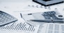 financial charts and graphs on the table